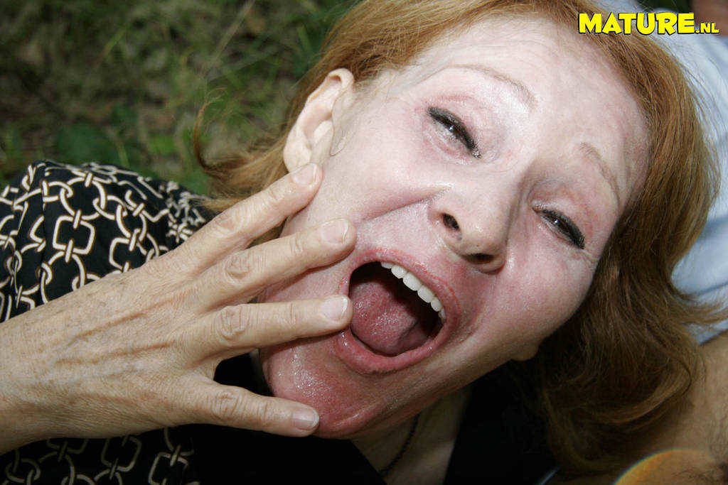 Red headed granny gets fucked in the forest